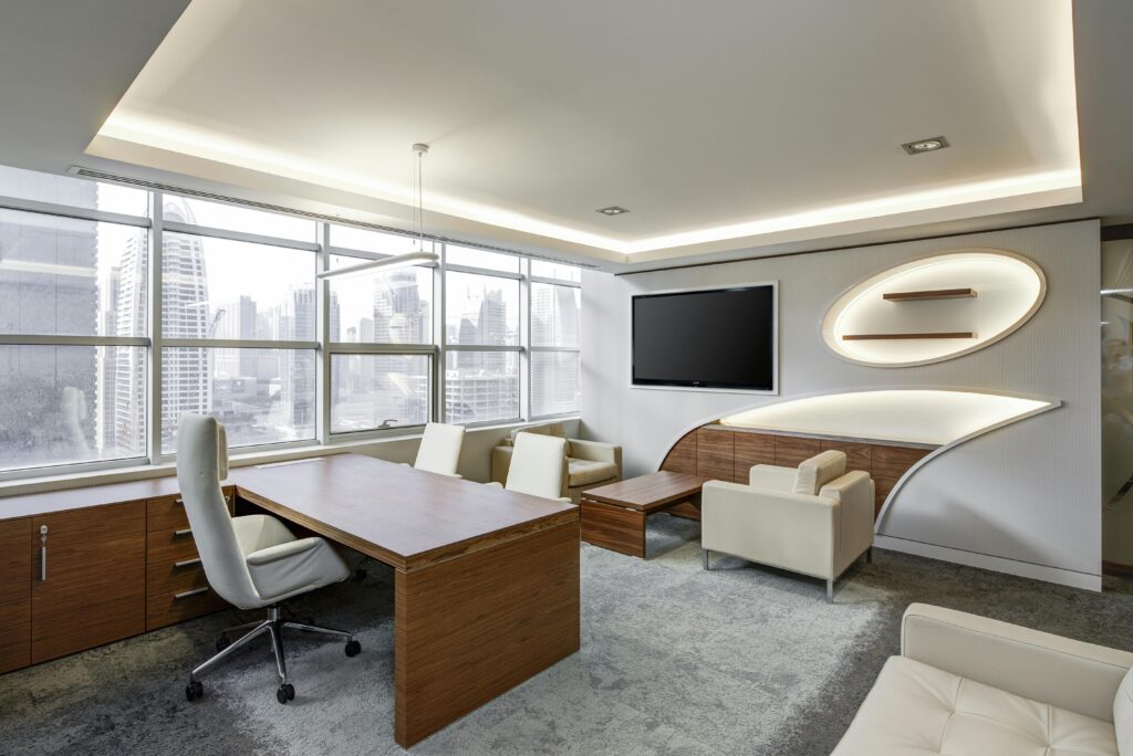 office-sitting-room-executive-sitting-37347 Sleek office space featuring contemporary furniture and city skyline views, ideal for professionals.